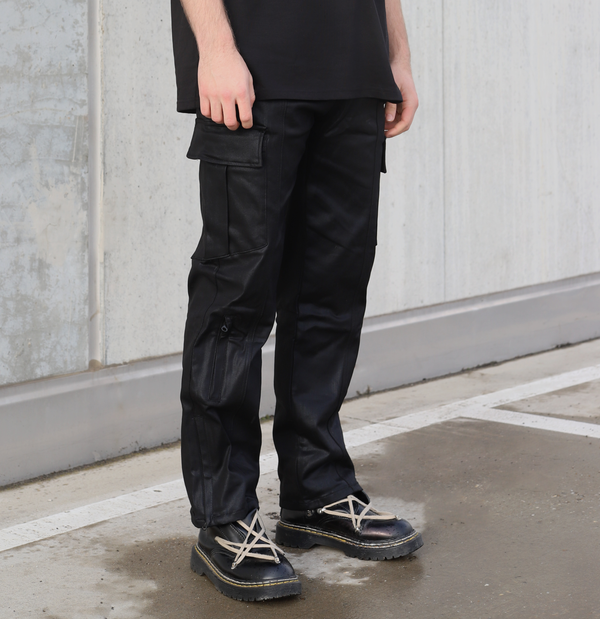 WAXED DENIM CARGO PANTS IN BLACK